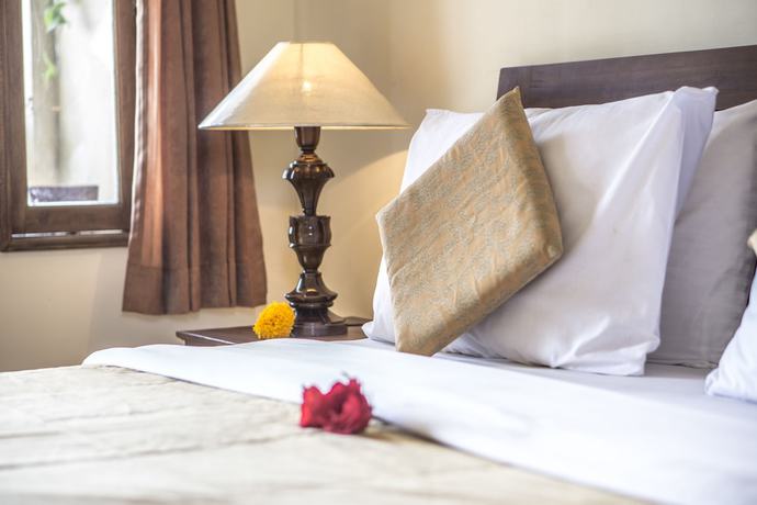 Imagen de la habitación del Hotel Ubud Sensasi Bungalows. Foto 10
