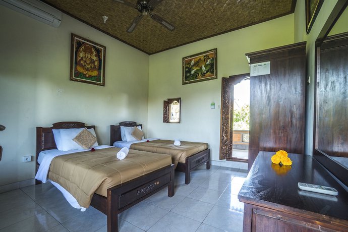 Imagen de la habitación del Hotel Ubud Sensasi Bungalows. Foto 17