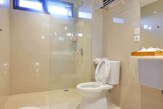 Imagen de la habitación del Hotel UbudOne. Foto 15