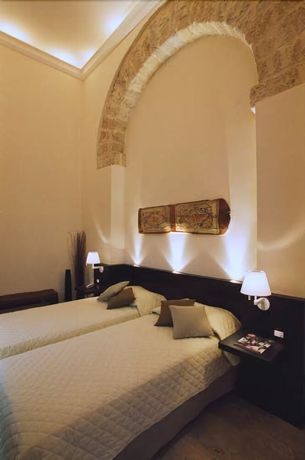 Imagen de la habitación del Hotel Ucciardhome. Foto 11