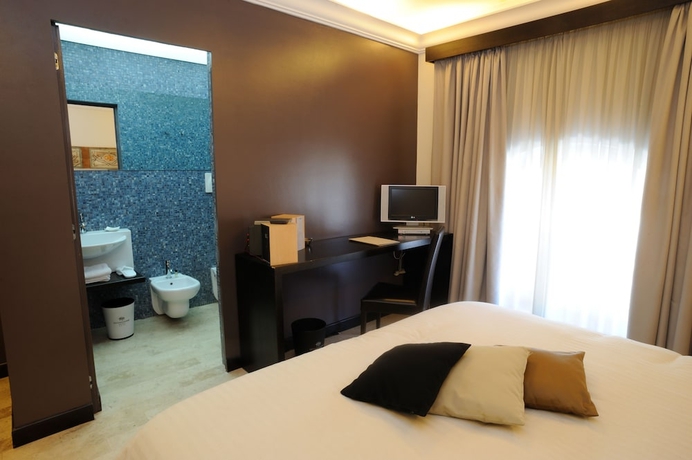 Imagen de la habitación del Hotel Ucciardhome. Foto 16