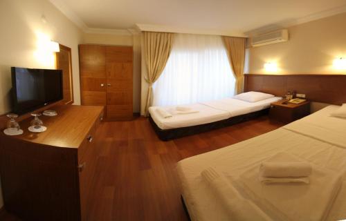Imagen de la habitación del Hotel Ucem Golden Sea. Foto 9