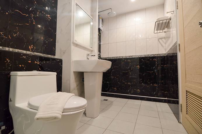 Imagen de la habitación del Hotel Ud Capital. Foto 18