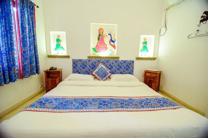 Imagen de la habitación del Hotel Udaigarh. Foto 18