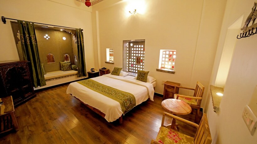 Imagen de la habitación del Hotel Udaigarh. Foto 19