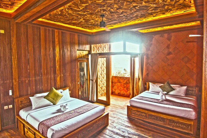 Imagen de la habitación del Hotel Udara Bali. Foto 36