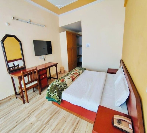 Imagen de la habitación del Hotel Uday Palace, Chamoli. Foto 5