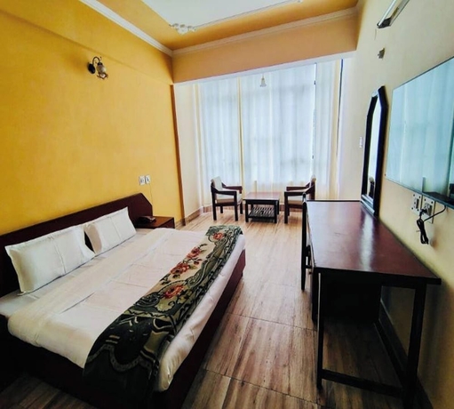 Imagen de la habitación del Hotel Uday Palace, Chamoli. Foto 7