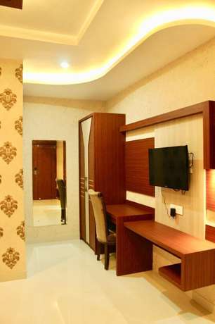 Imagen de la habitación del Hotel Uday Palace. Foto 7