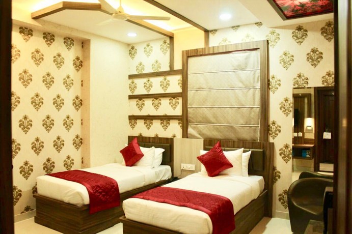 Imagen de la habitación del Hotel Uday Palace. Foto 11