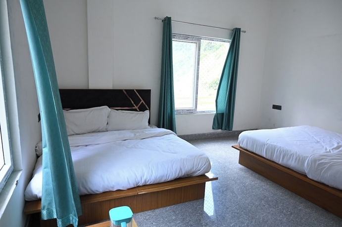 Imagen de la habitación del Hotel Uday Villa. Foto 6