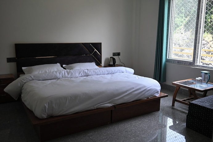 Imagen de la habitación del Hotel Uday Villa. Foto 7