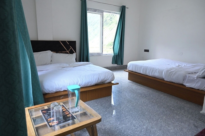 Imagen de la habitación del Hotel Uday Villa. Foto 10