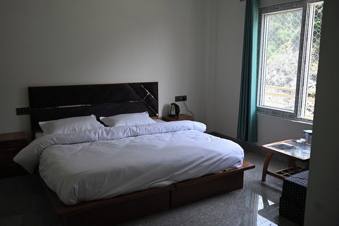 Imagen de la habitación del Hotel Uday Villa. Foto 11