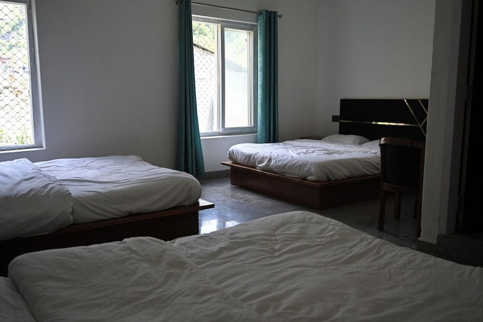 Imagen de la habitación del Hotel Uday Villa. Foto 14