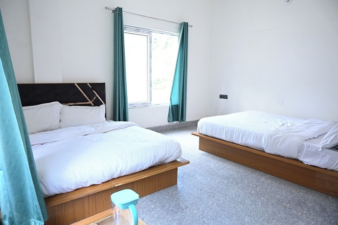 Imagen de la habitación del Hotel Uday Villa. Foto 15