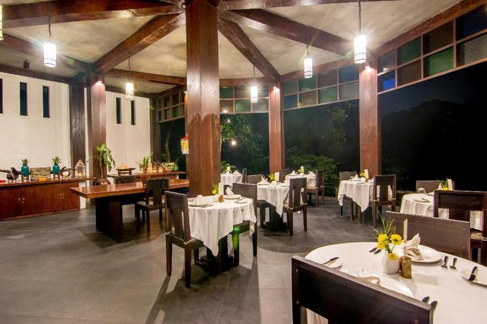 Imagen del bar/restaurante del Hotel Udhiana Resort Ubud. Foto 3