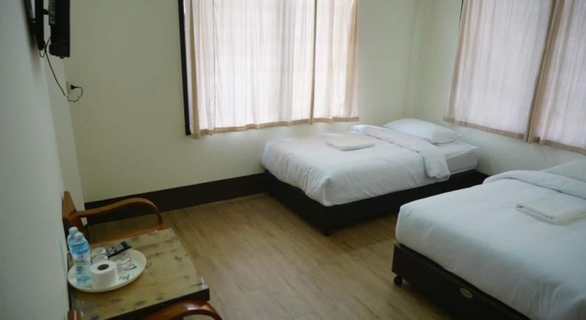 Imagen de la habitación del Hotel Udomsuk. Foto 12