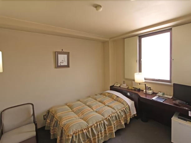 Imagen de la habitación del Hotel Ueda Plaza. Foto 7