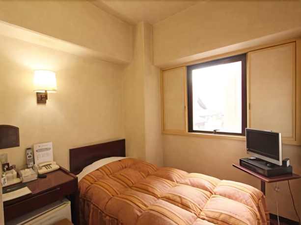 Imagen de la habitación del Hotel Ueda Plaza. Foto 8