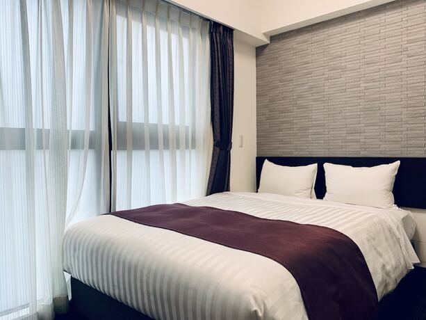 Imagen de la habitación del Hotel Ueno Urban. Foto 14