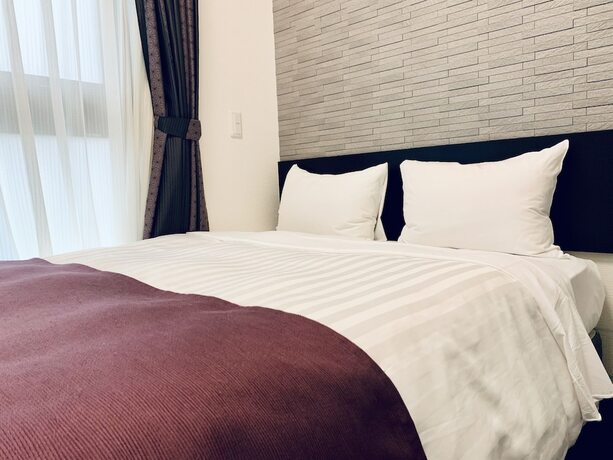 Imagen de la habitación del Hotel Ueno Urban. Foto 16
