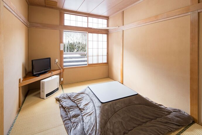 Imagen de la habitación del Hotel Uenohara Lodge Yamanoie. Foto 8