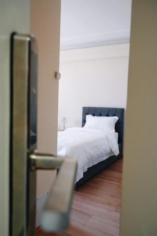 Imagen de la habitación del Hotel Ufo Rooms City Center. Foto 3