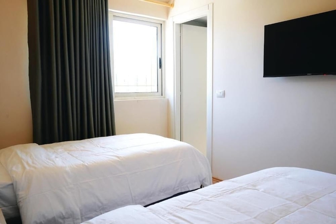 Imagen de la habitación del Hotel Ufo Rooms City Center. Foto 6