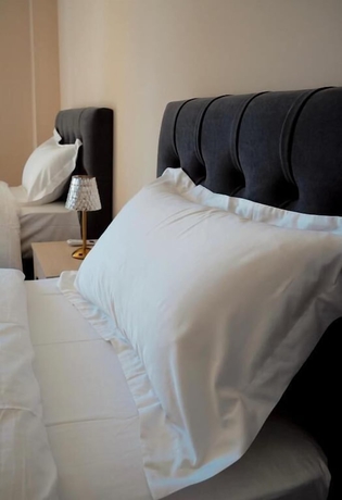 Imagen de la habitación del Hotel Ufo Rooms City Center. Foto 13