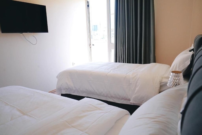 Imagen de la habitación del Hotel Ufo Rooms City Center. Foto 16