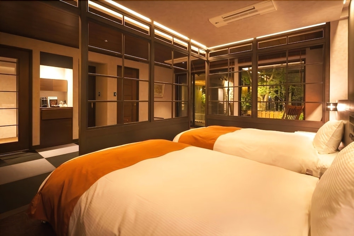 Imagen de la habitación del Hotel Ufufu. Foto 13
