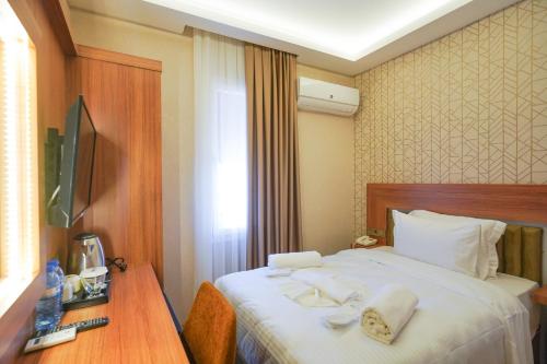 Imagen de la habitación del Hotel Ugurlu. Foto 19