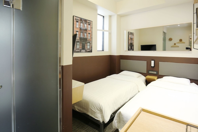 Imagen de la habitación del Hotel Uh. Foto 11