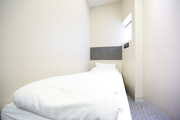 Imagen de la habitación del Hotel Uh. Foto 13