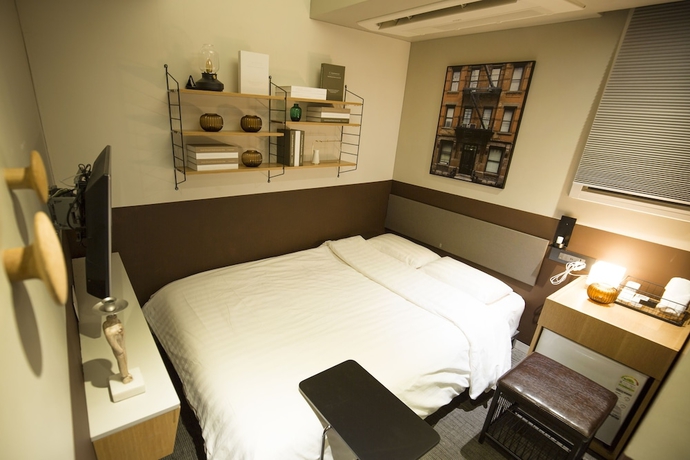 Imagen de la habitación del Hotel Uh. Foto 16