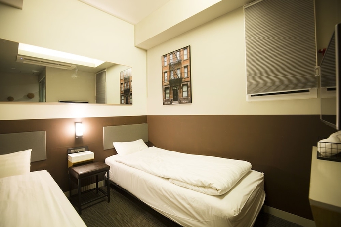 Imagen de la habitación del Hotel Uh. Foto 19