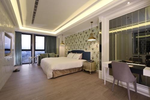Imagen de la habitación del Hotel U-her. Foto 6