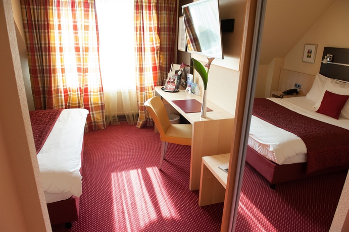 Imagen de la habitación del Hotel Uhu Garni Köln. Foto 9