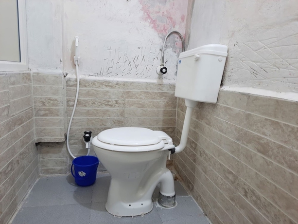 Imagen de la habitación del Hotel Ujjain Yatri Niwas. Foto 11