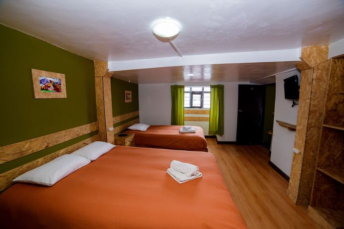 Imagen de la habitación del Hotel Ukukus Hostel. Foto 9