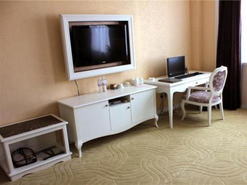 Imagen de la habitación del Hotel Ulanqab Jinhao Jianguo. Foto 7