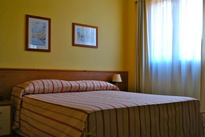 Imagen de la habitación del Hotel Ulivi. Foto 7