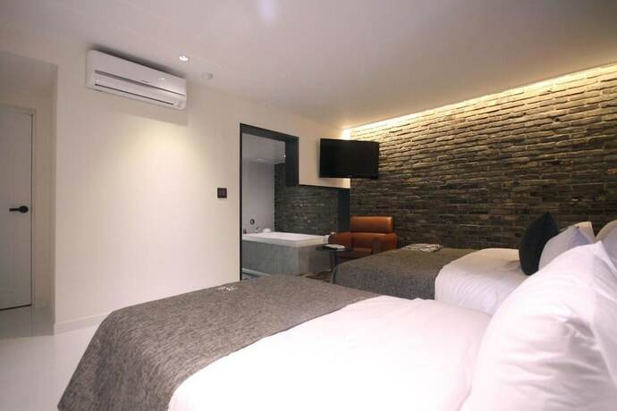 Imagen de la habitación del Hotel Ulsan Junggu Jb Design. Foto 22