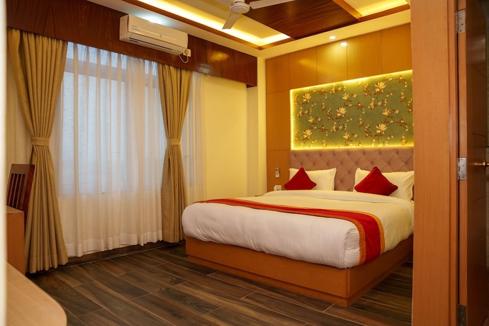 Imagen de la habitación del Hotel Ultra International. Foto 7