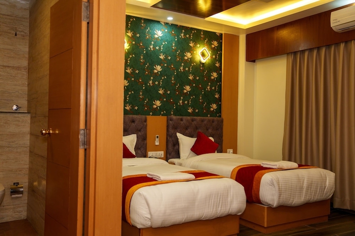 Imagen de la habitación del Hotel Ultra International. Foto 9