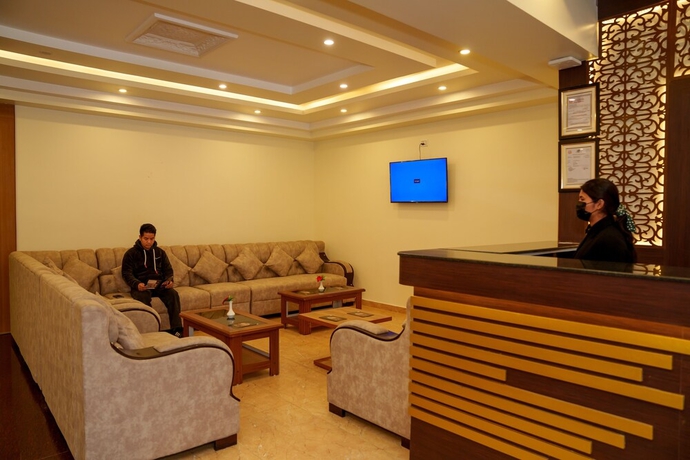 Imagen de la habitación del Hotel Ultra International. Foto 11