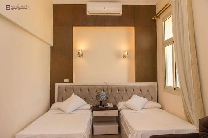 Imagen de la habitación del Hotel Ultra Loaloa Nile Maadi. Foto 4