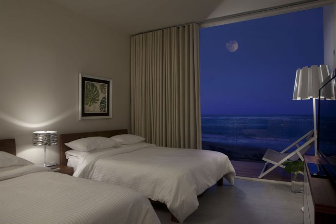 Imagen de la habitación del Hotel Ultravioleta Boutique Residences. Foto 8