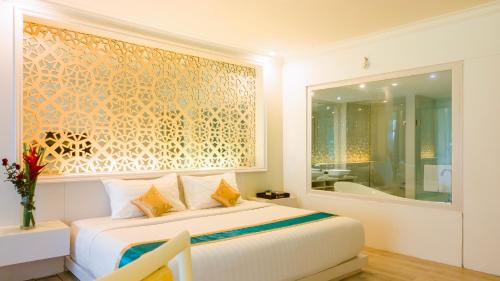 Imagen de la habitación del Hotel Ululani Bali. Foto 18